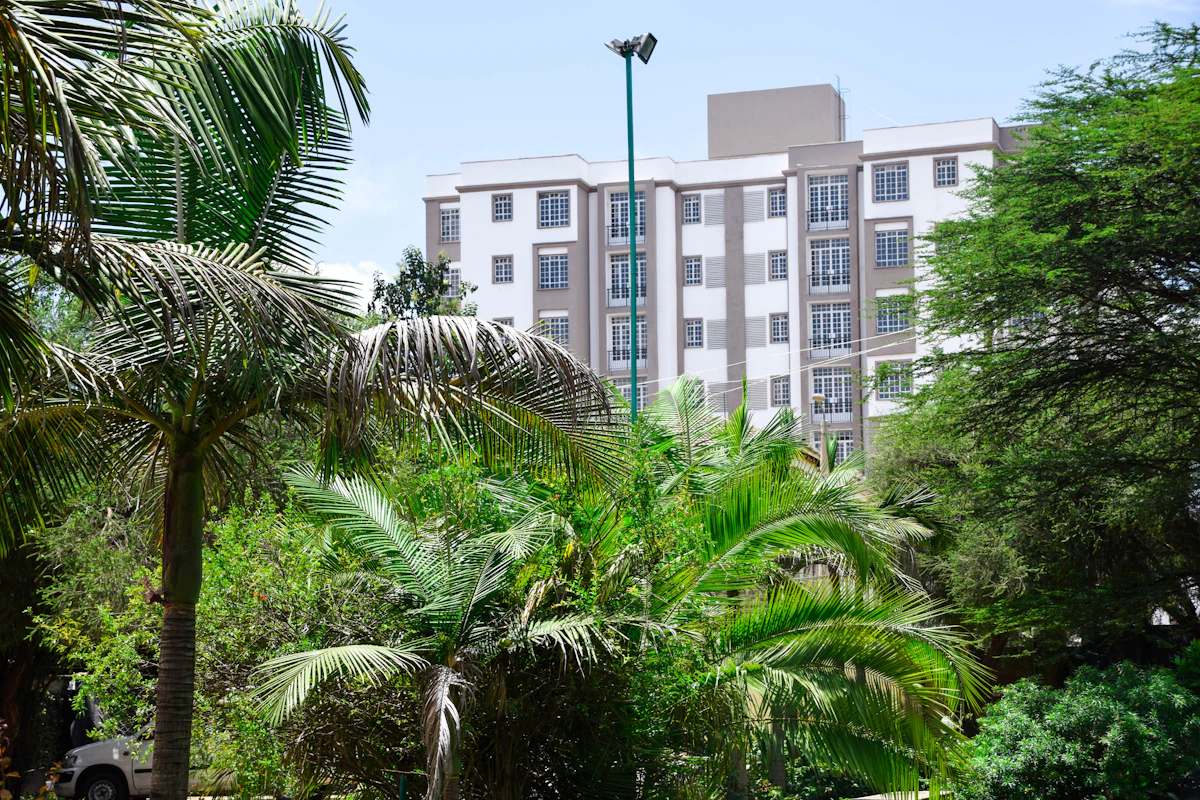 A building with palm trees in front of it