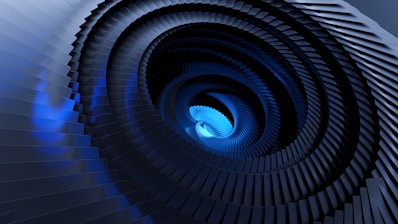 a spiral staircase with a blue light