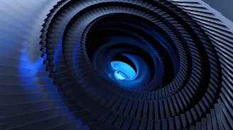 a spiral staircase with a blue light