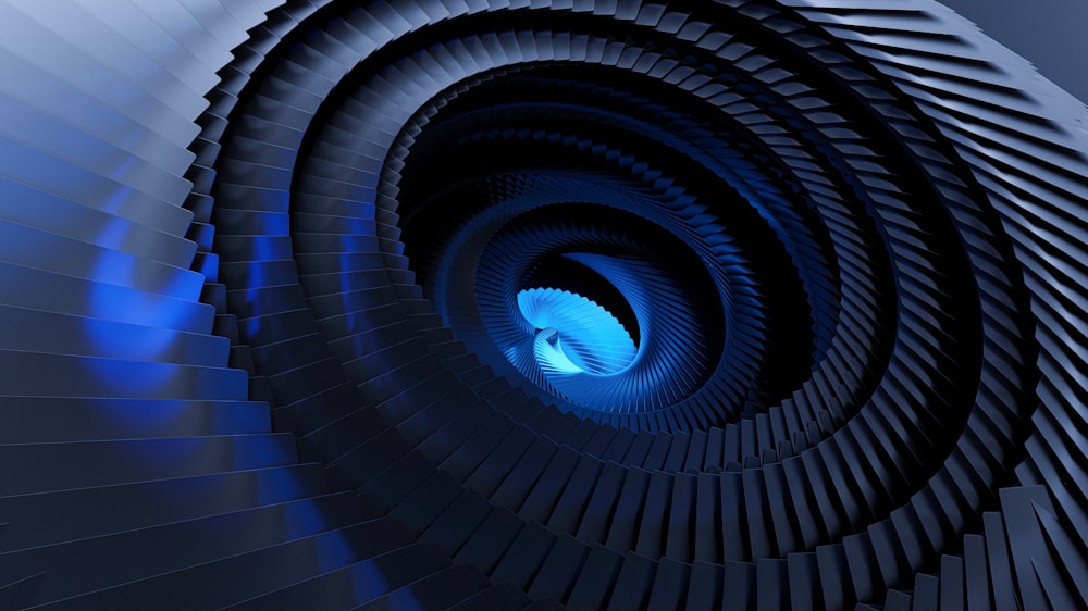 a spiral staircase with a blue light