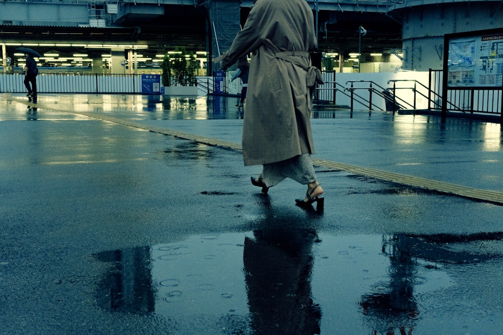 a person walking in the rain
