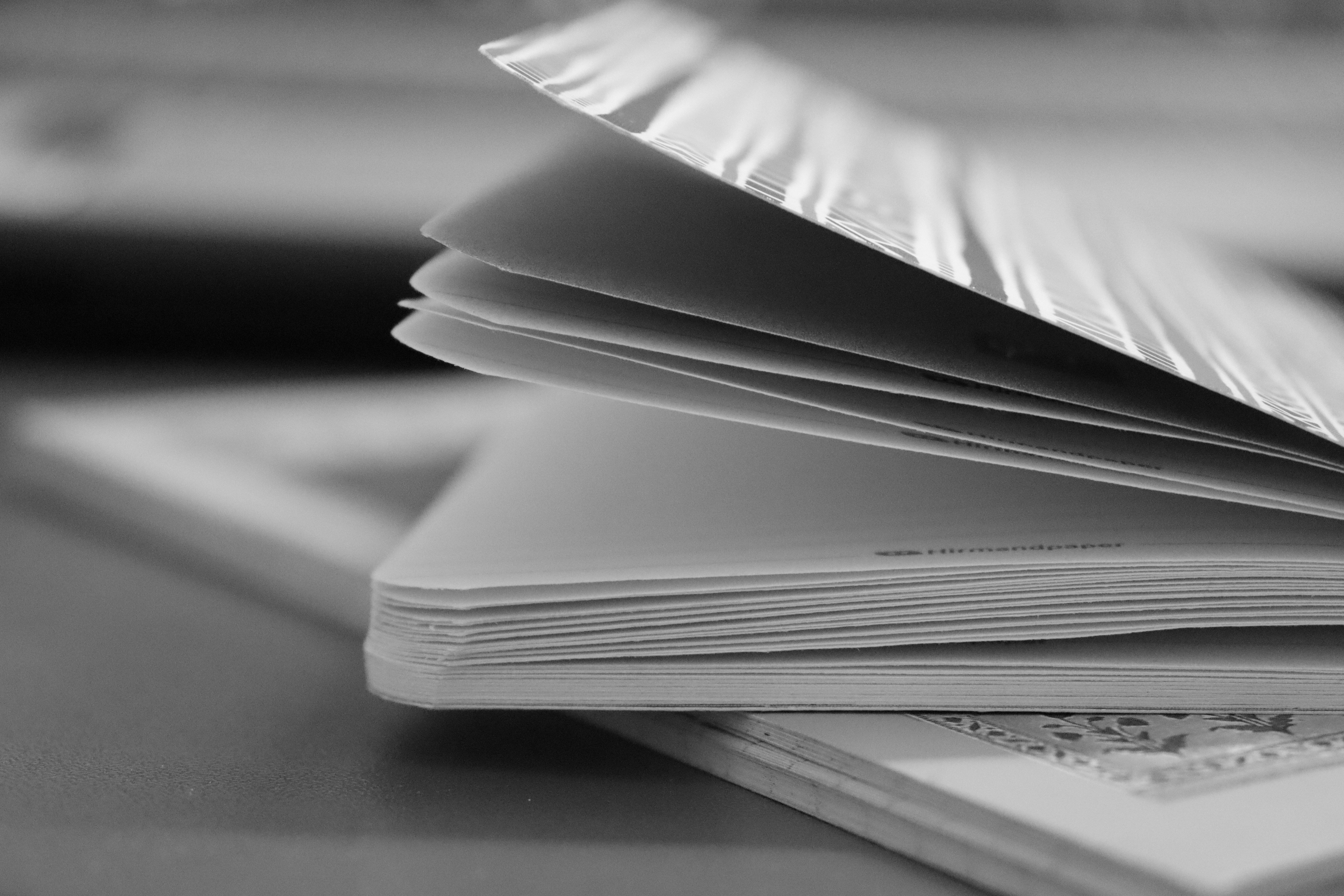 A stack of books about business music licensing terms explains the many different kinds of copyright