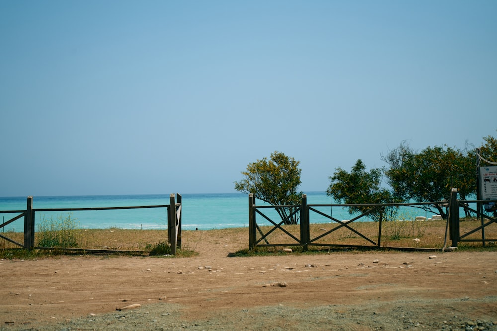 a fence and a beach