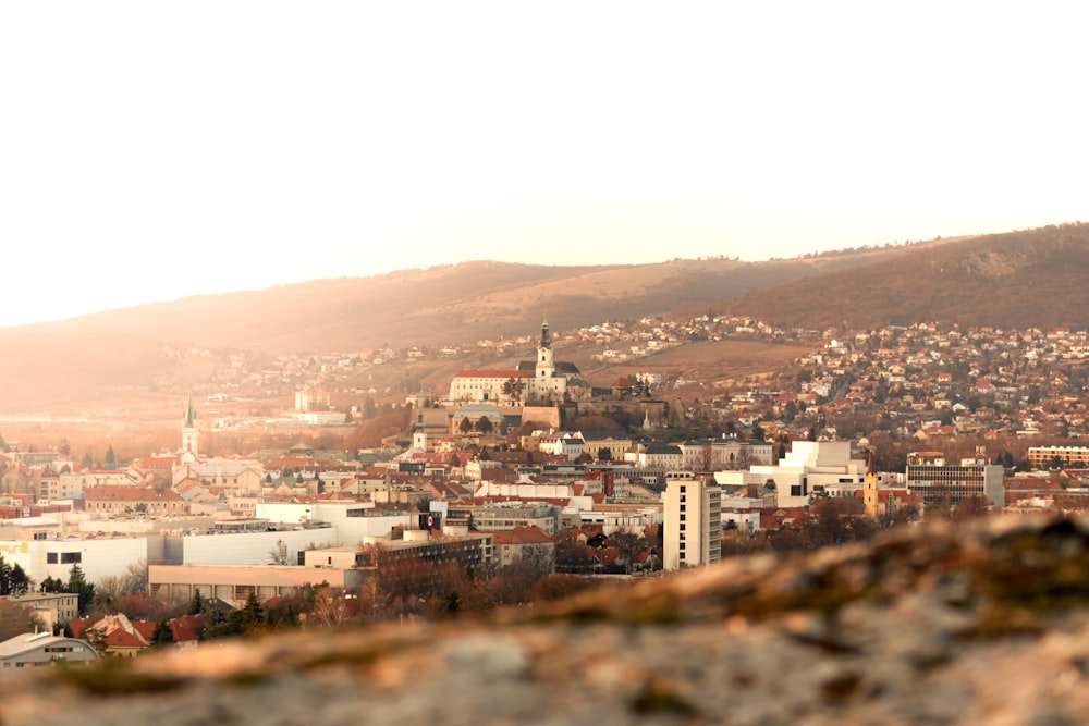 a city with a hill in the background