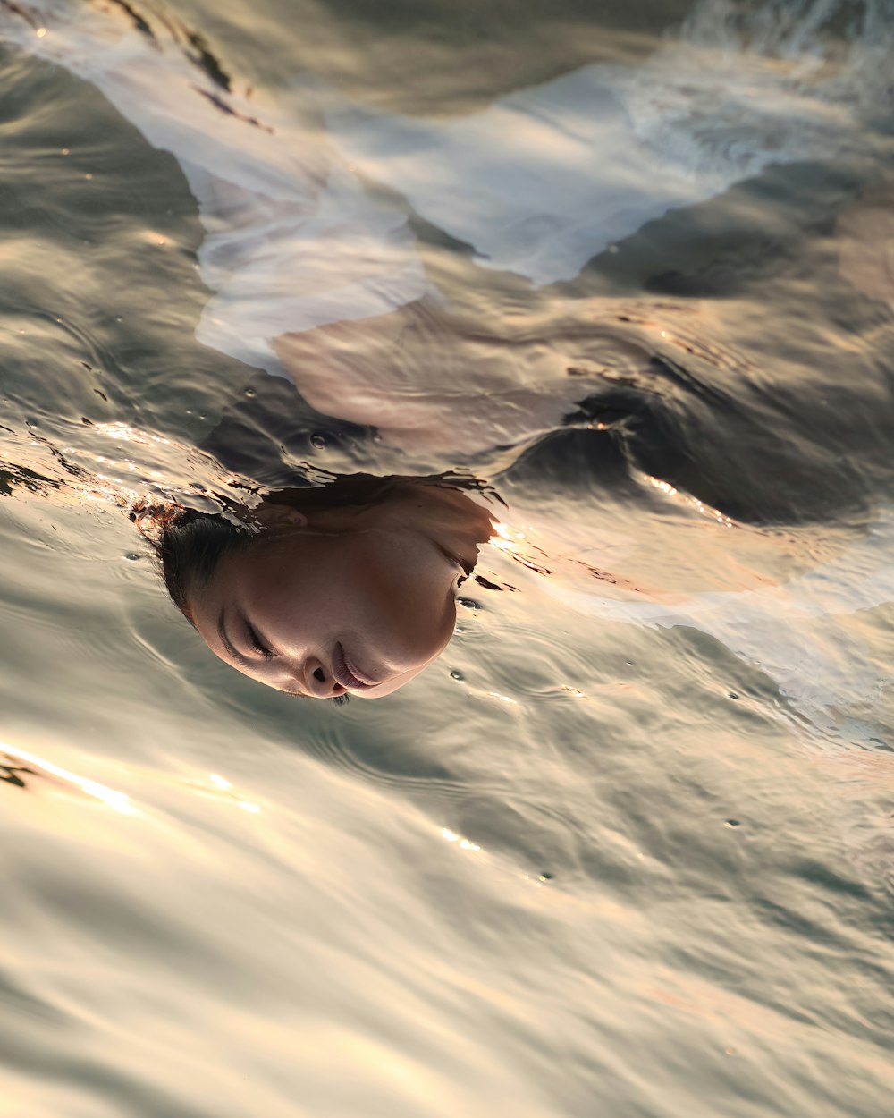 a person swimming in water