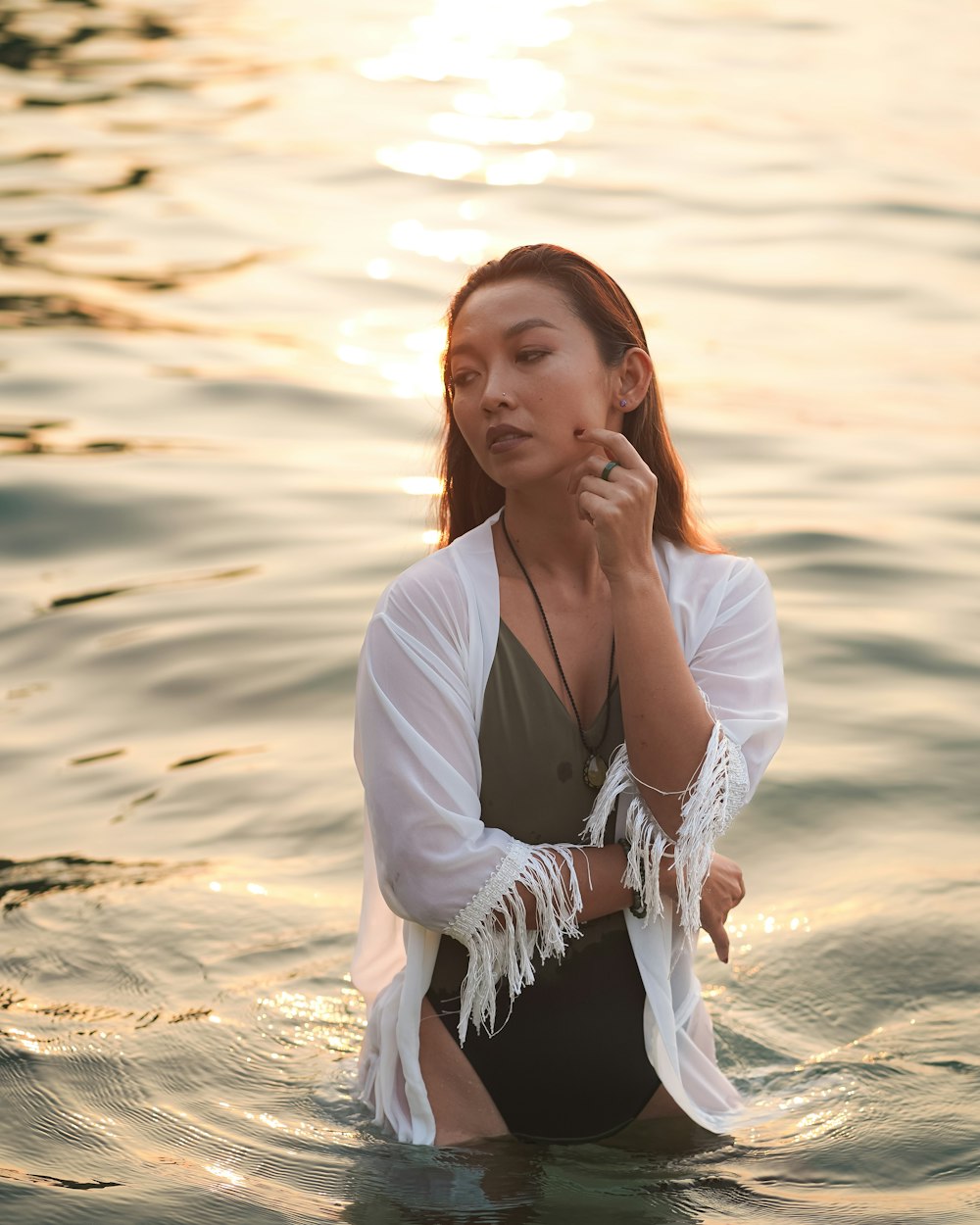 a woman standing in water