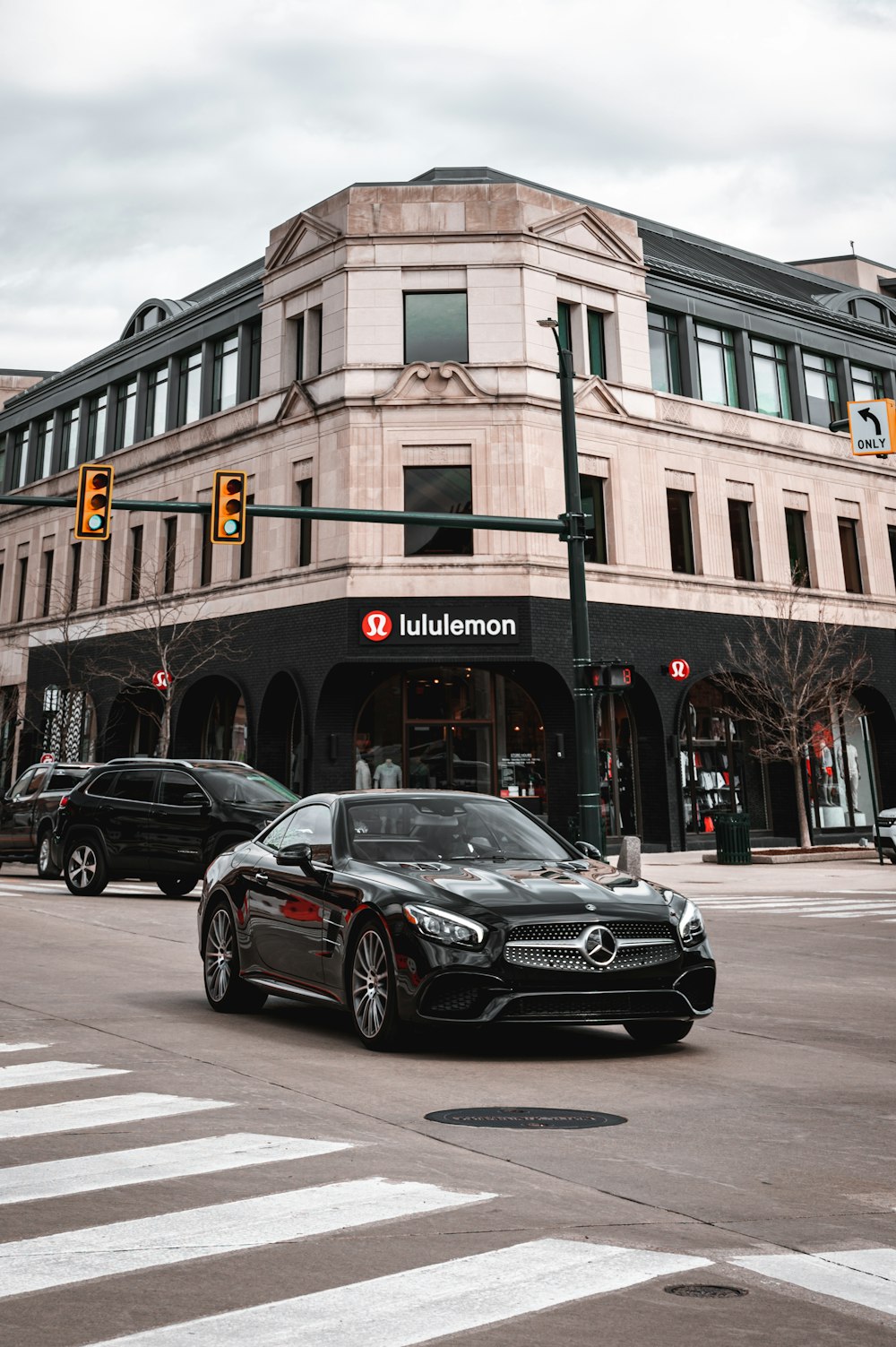 a black sports car on the street