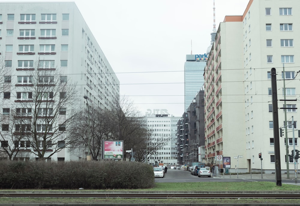 a street with cars and buildings on either side of it