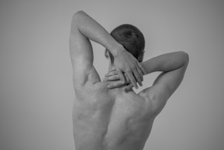 a man with his hands on his chest