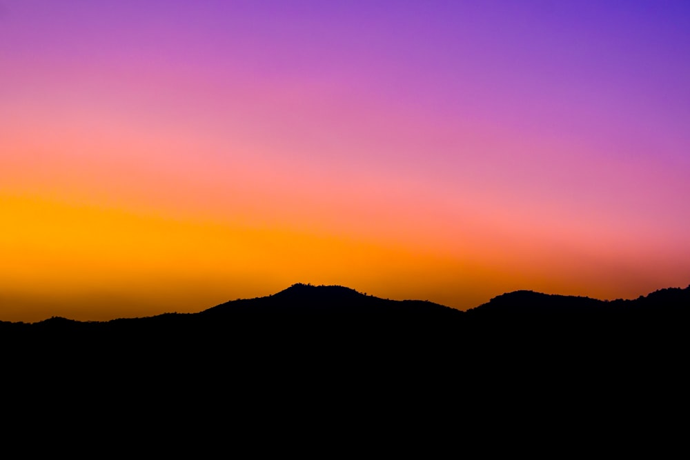 clouds in front of a sunset