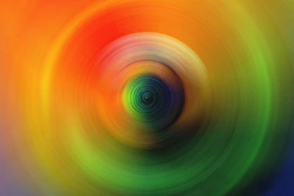 a close up of a green and orange circle