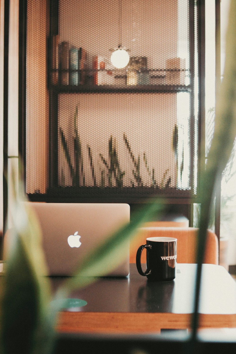 a laptop sits on a table