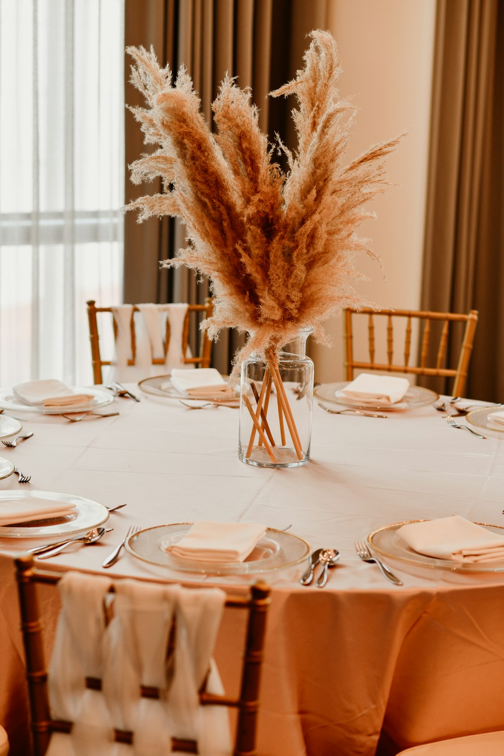 a table set with plates and glasses