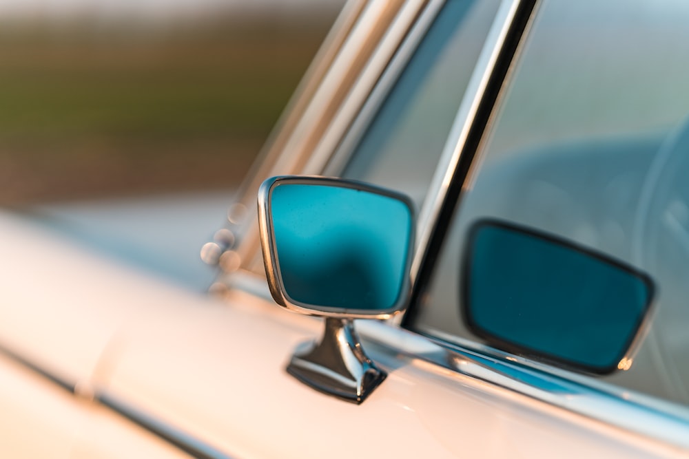 a close up of a car's side mirror