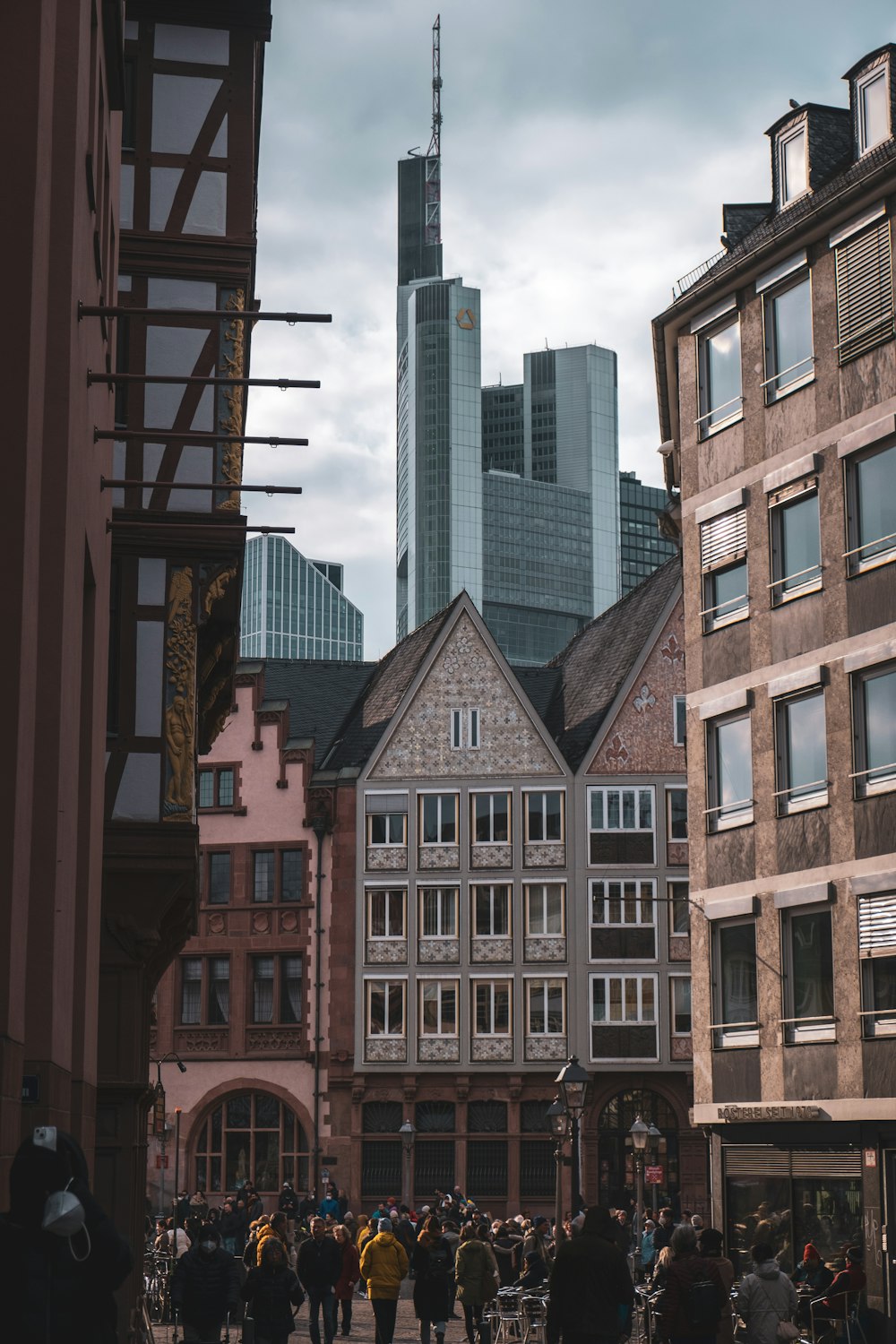 a group of people walking in a city