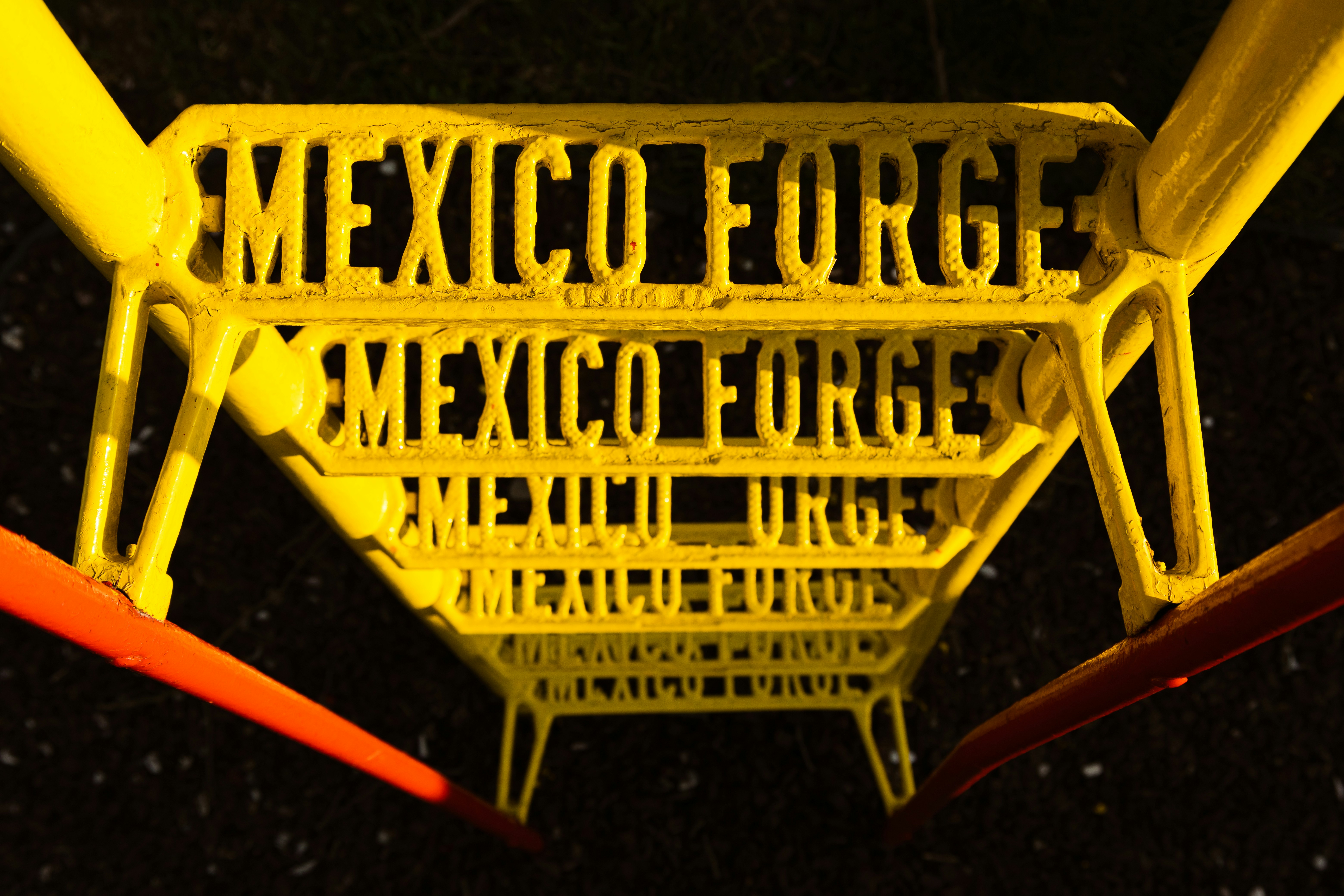 a yellow sign with black text