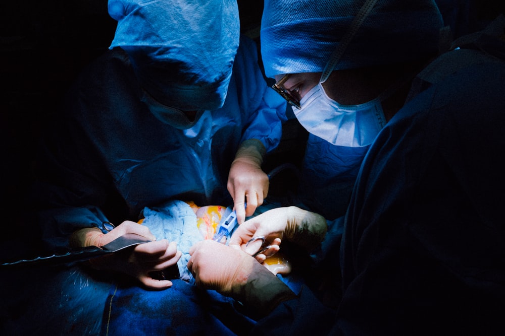 a group of doctors attending to a patient