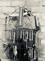 Image of plumbing and carpentry tools neatly arranged.