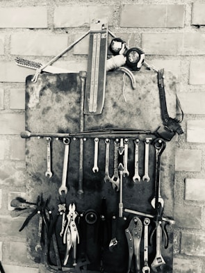 Image of plumbing and carpentry tools neatly arranged.