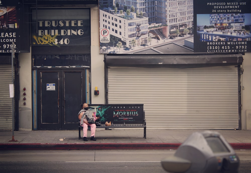 a person sitting on a bench