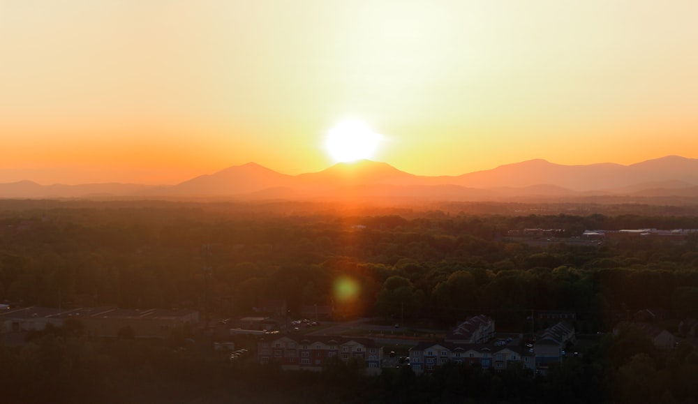 a sunset over a city