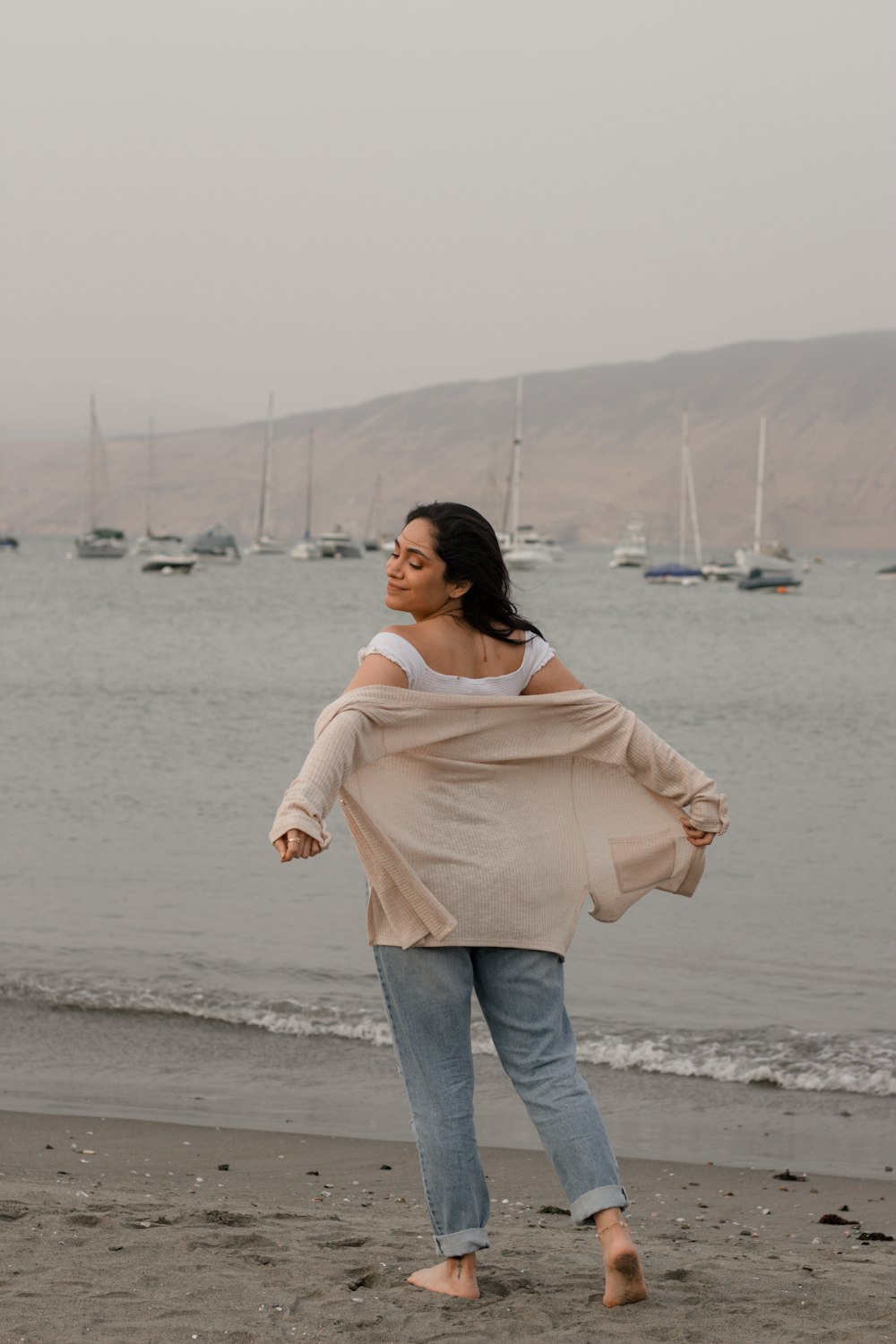 a person walking on a beach