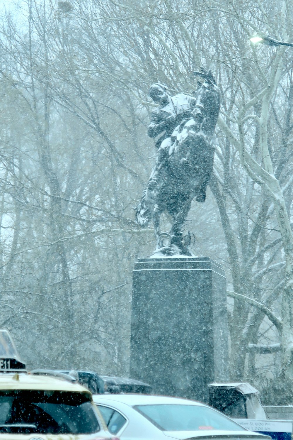 a statue in a snowy place