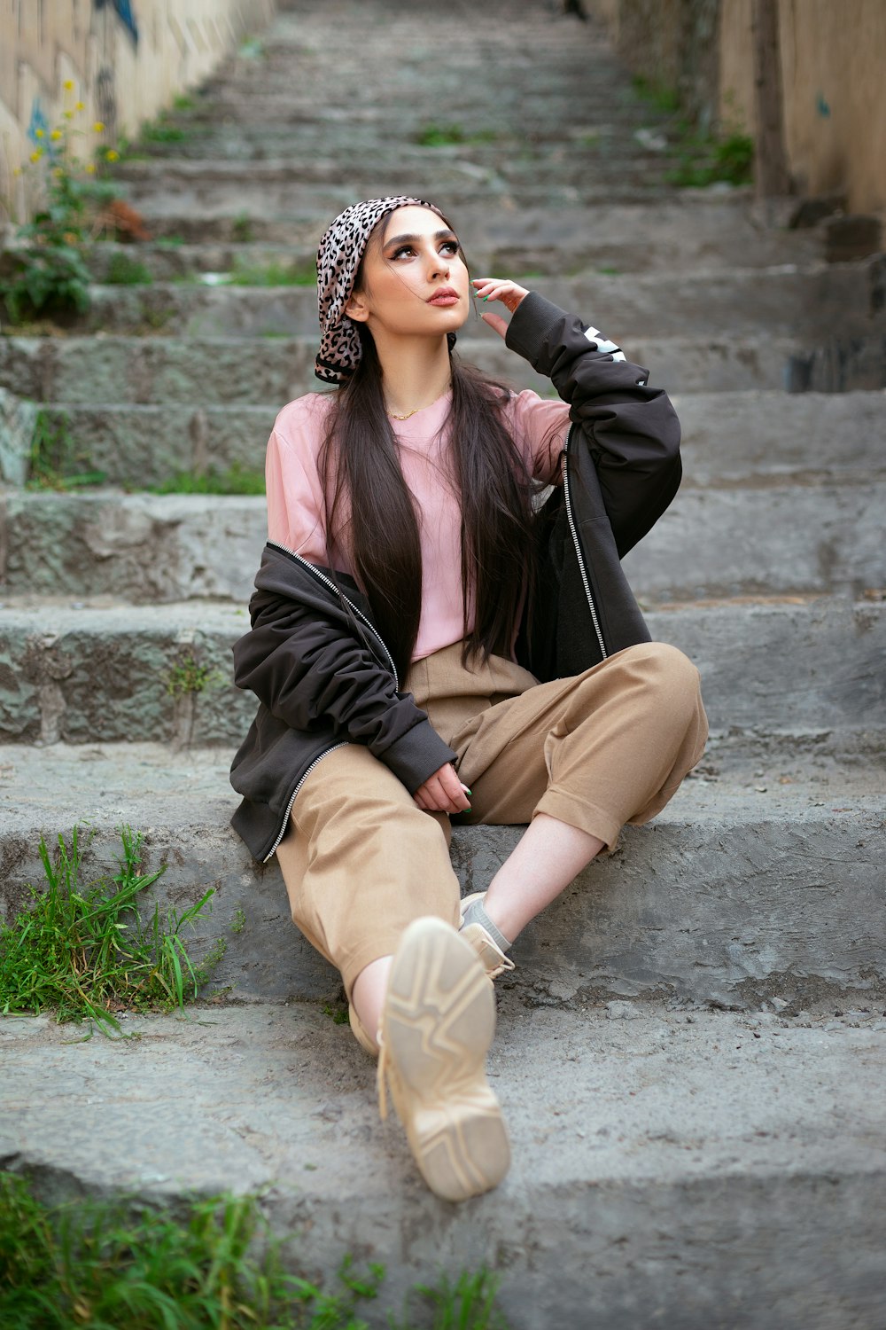 a person sitting on stairs