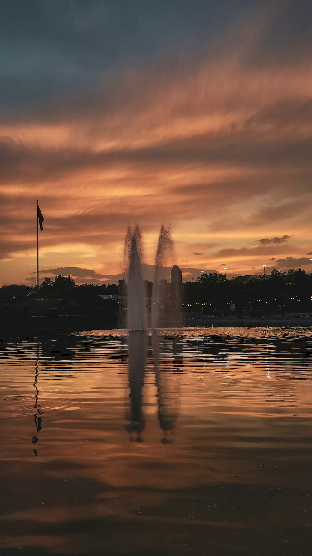 a fountain in a lake