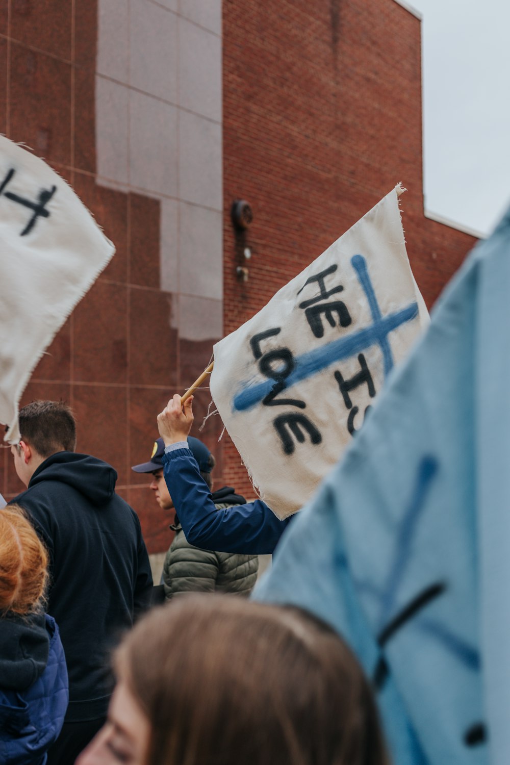 a person holding a sign