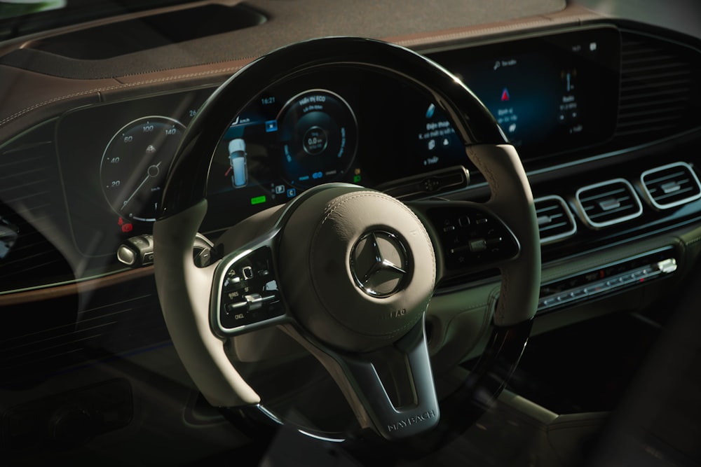 the steering wheel and dashboard of a car