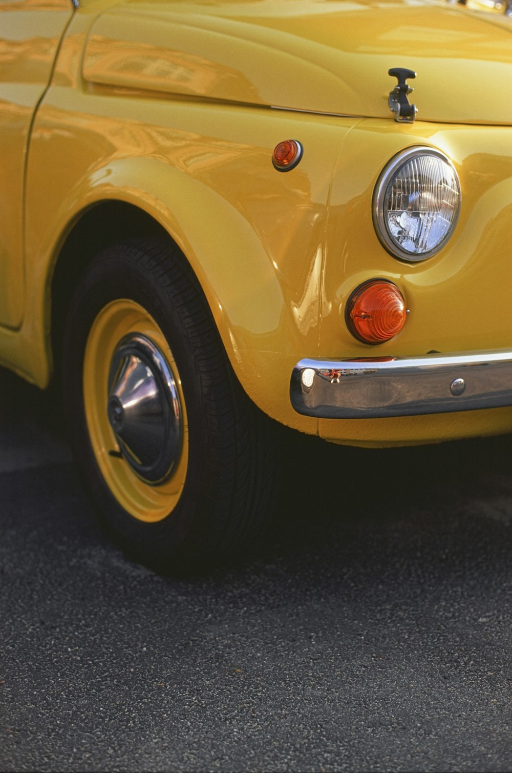 the front of a yellow car