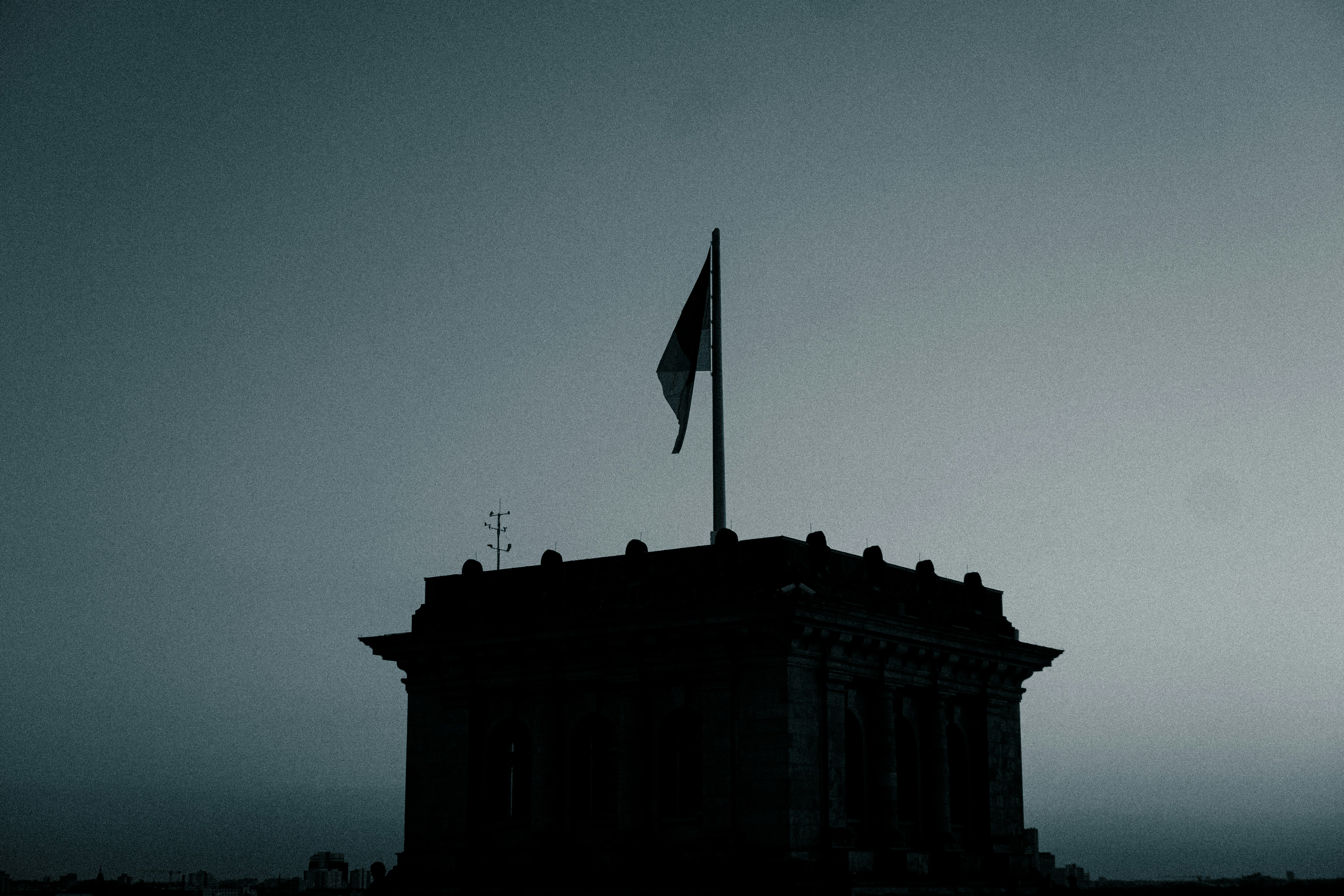 a flag on top of a building