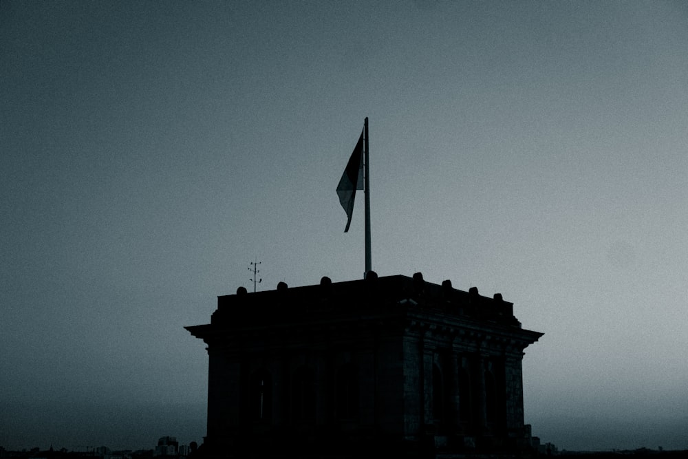 a flag on top of a building