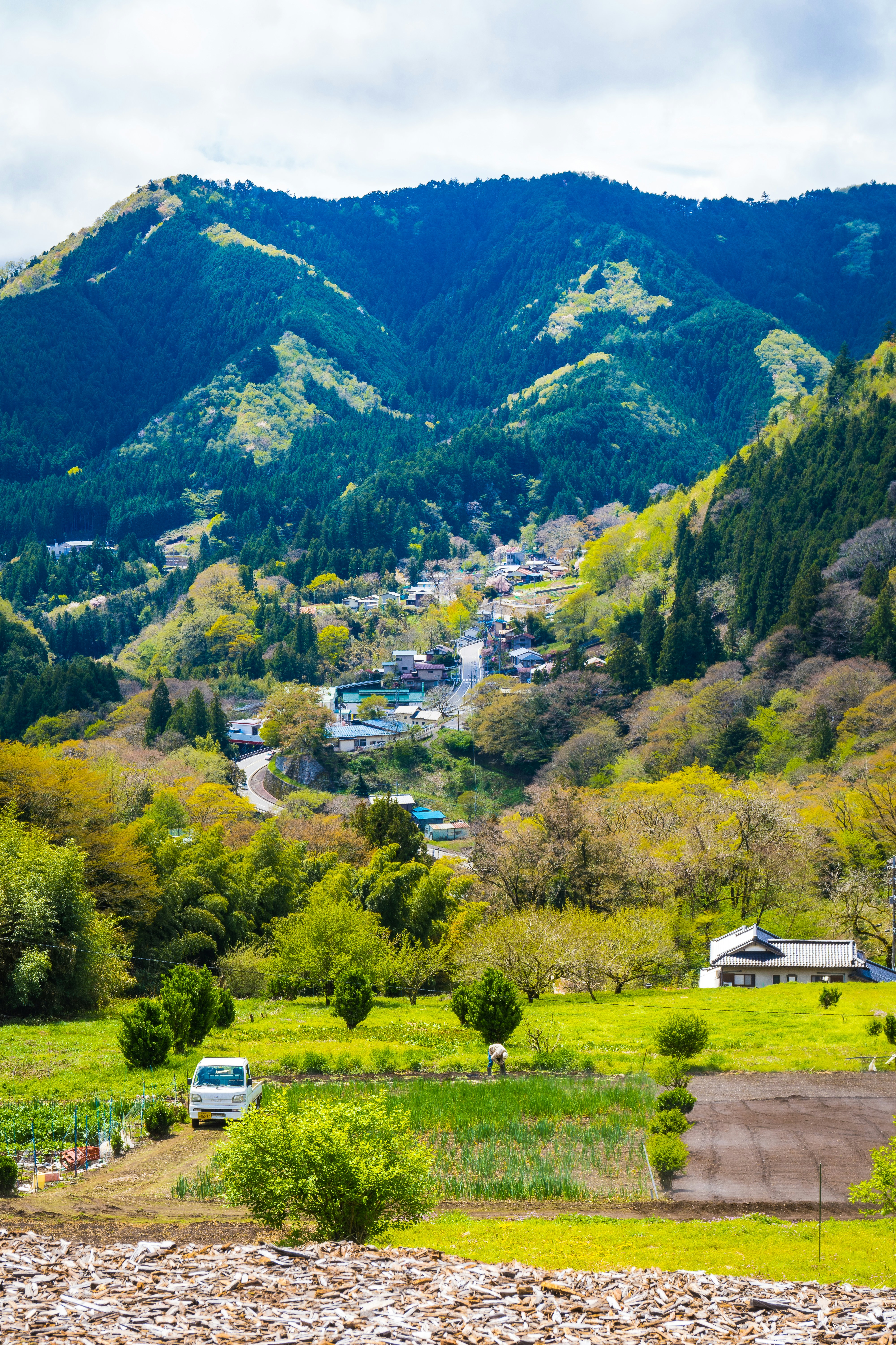 a van parked in a valley between mountains