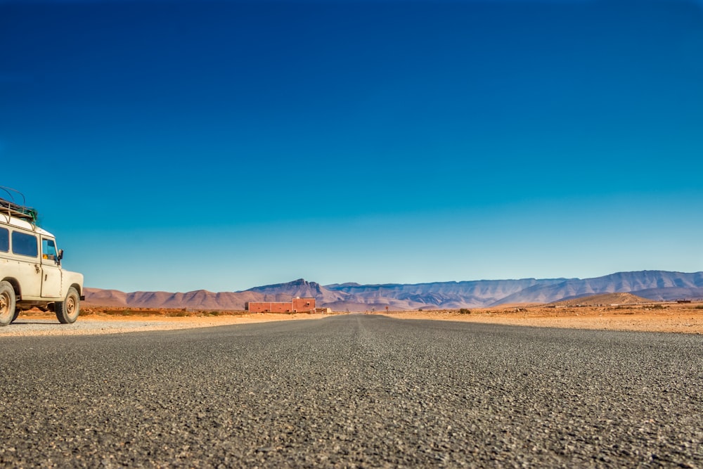 a truck parked on a road