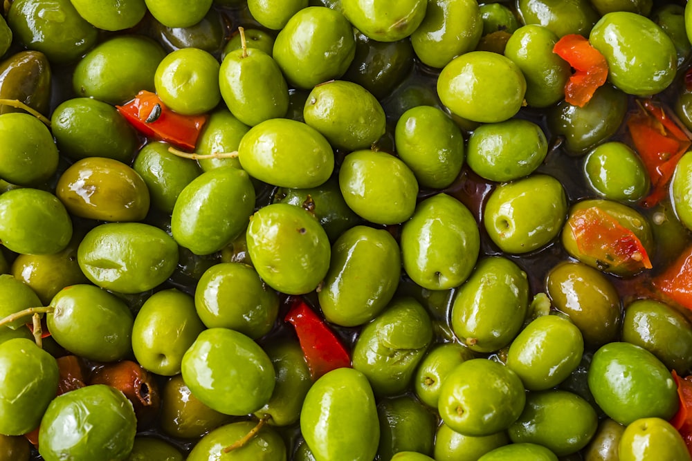 a pile of green fruit