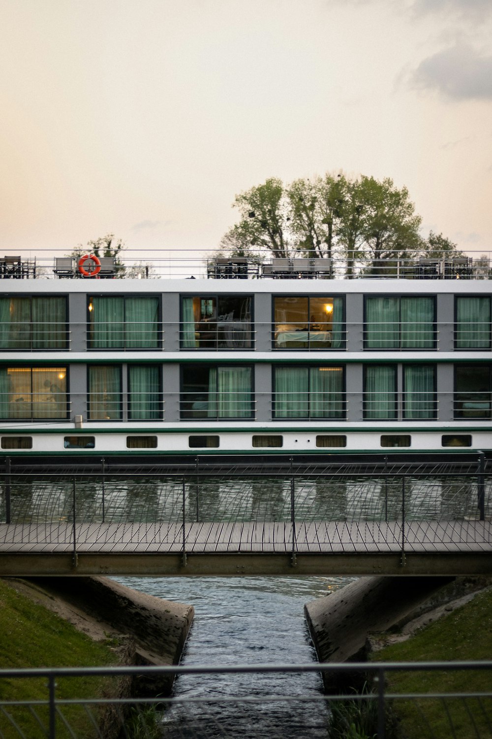 a building with a bridge over water