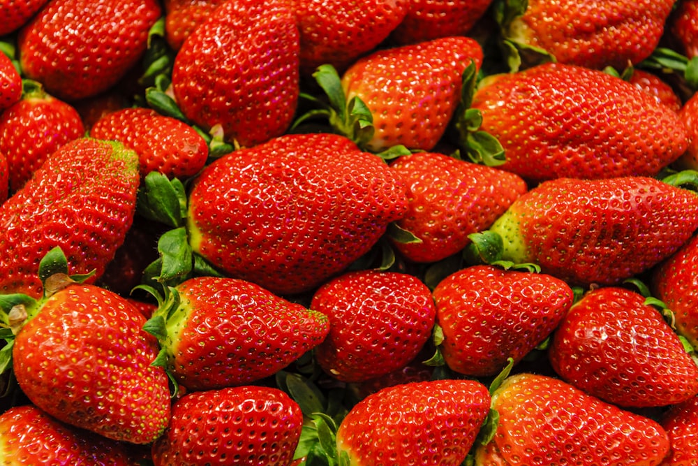 a pile of strawberries