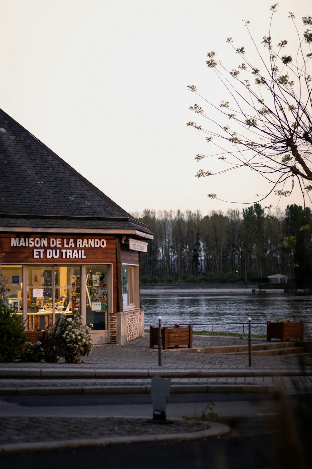 a building next to a body of water