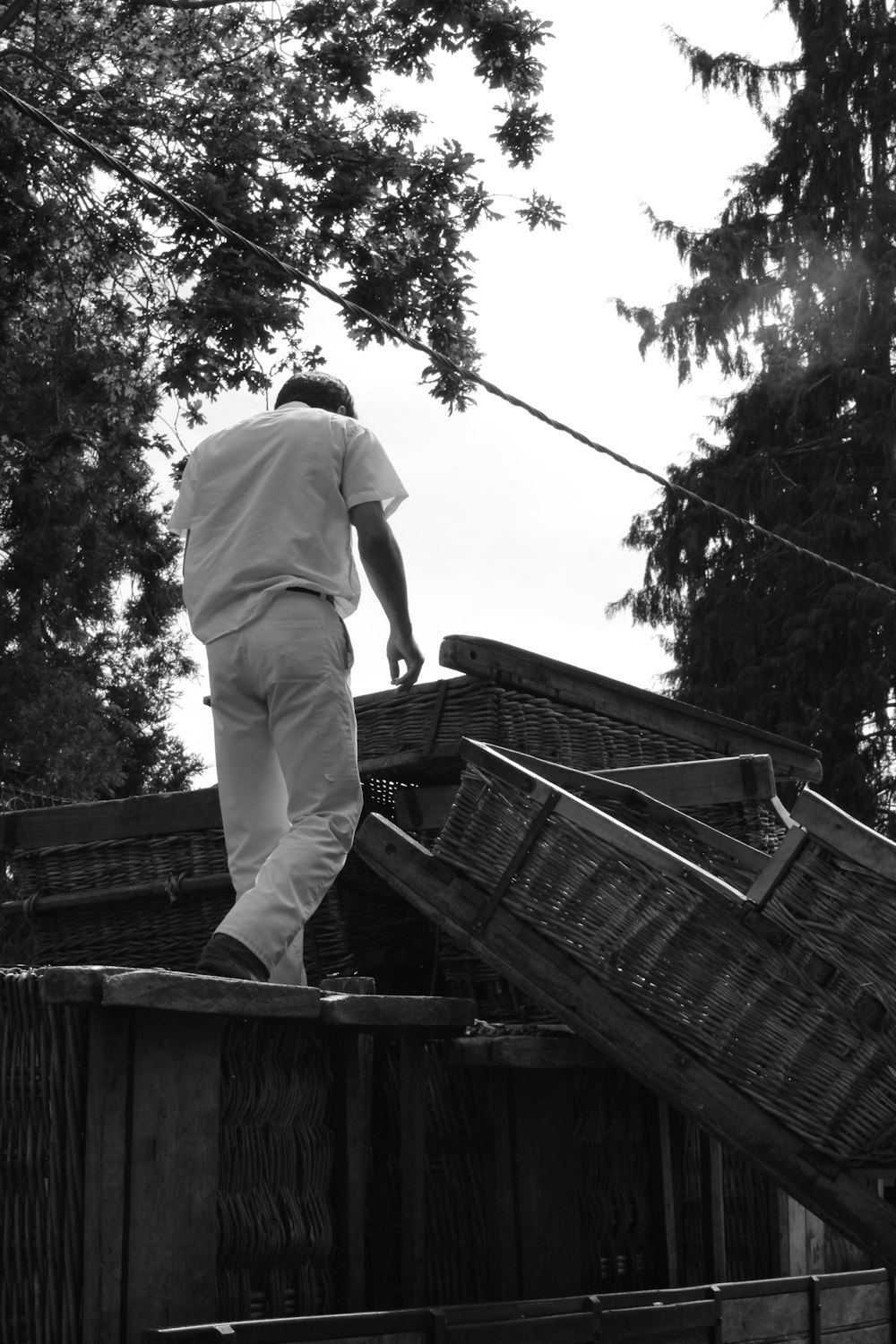 a man standing on a roof