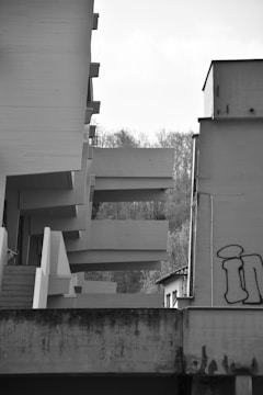 Slow panning grayscale architectural photo revealing subtle color on hover.