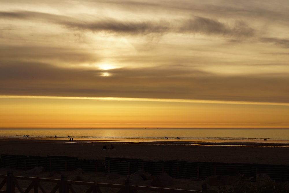 a sunset over a beach