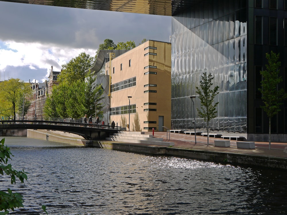 a building next to a body of water