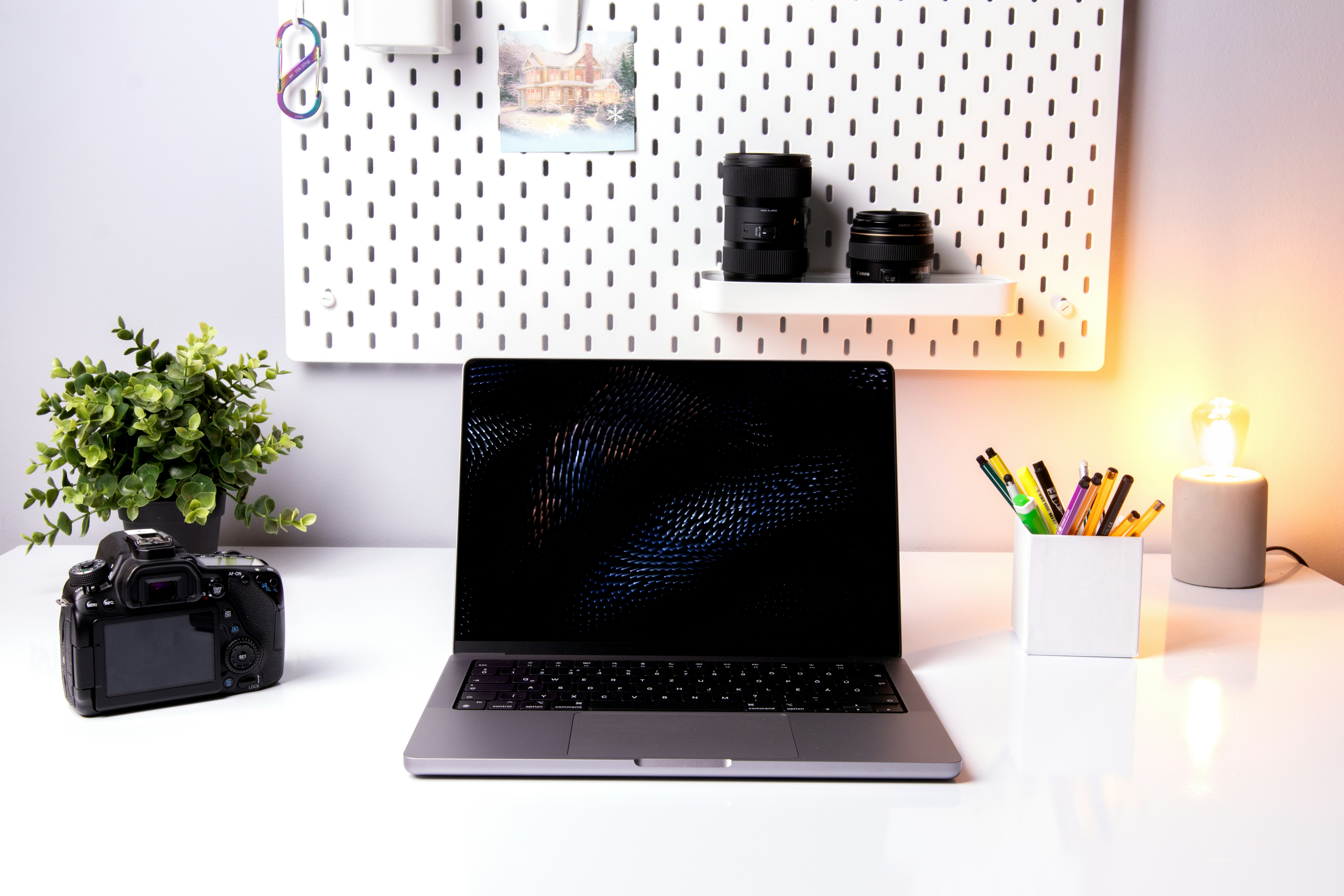sleek silver laptop computer resting on clean minimalist desk setup