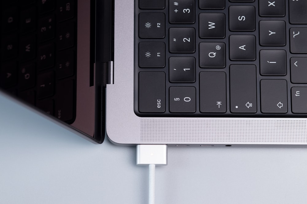 a black keyboard with a white background