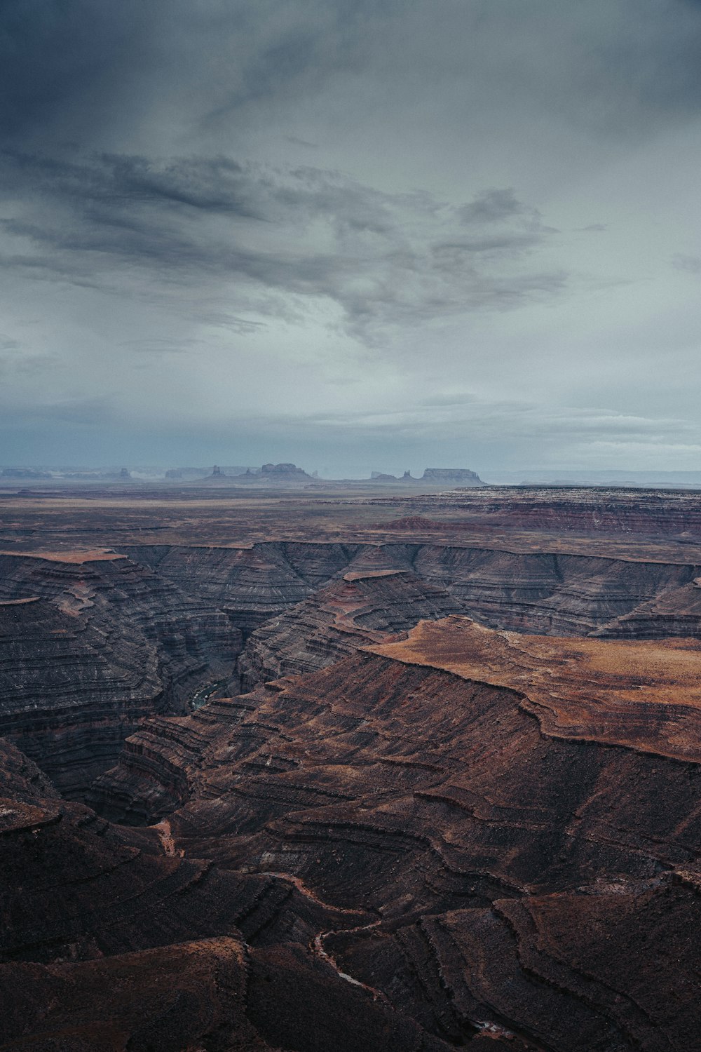 a large canyon with a river running through it