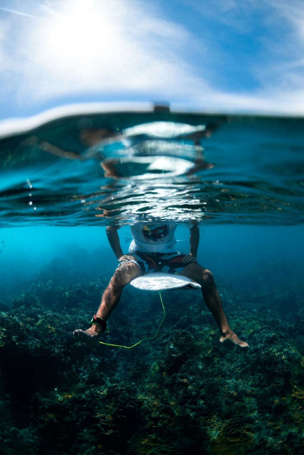 a man in the water with a scuba diver