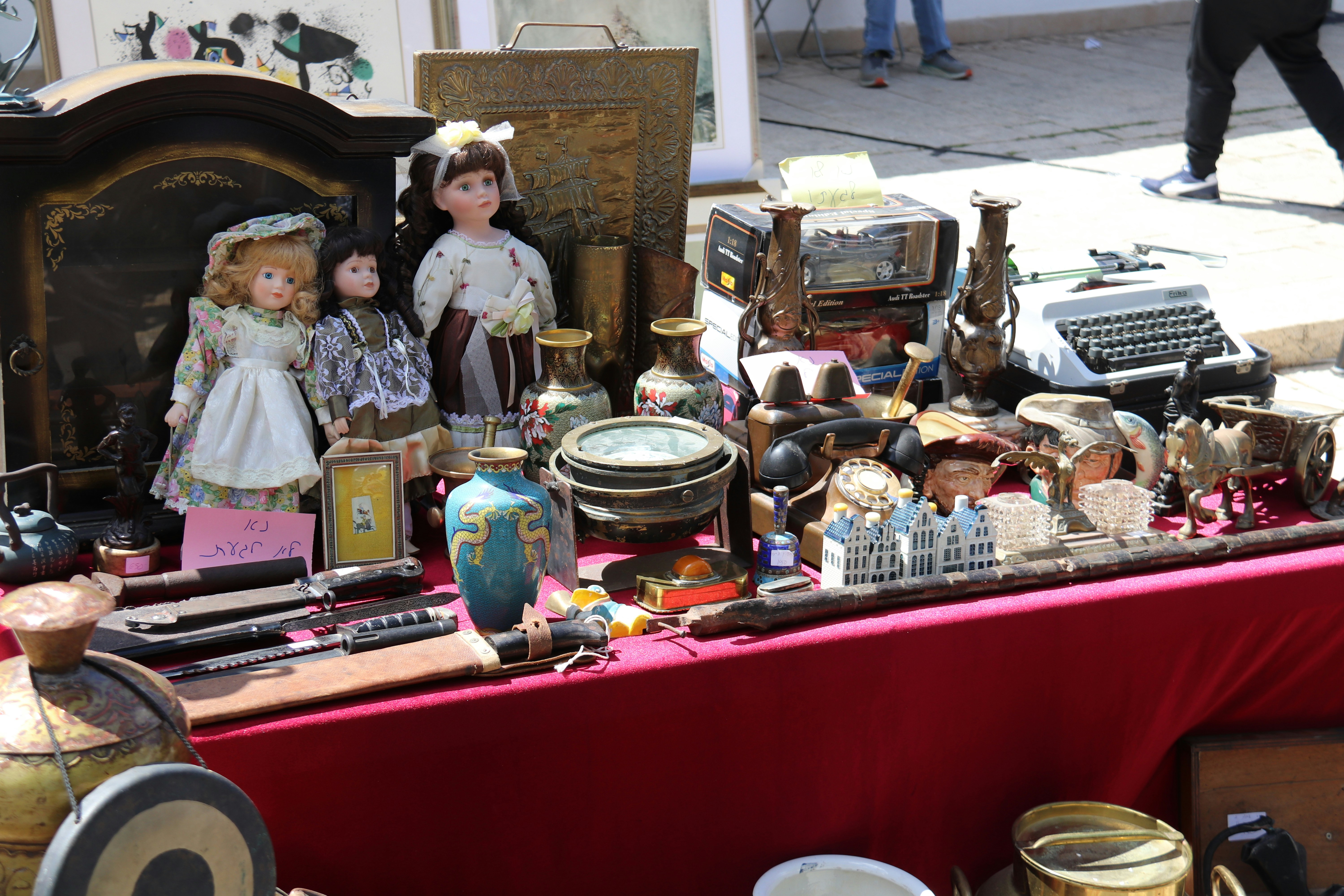 a table with antique items on it
