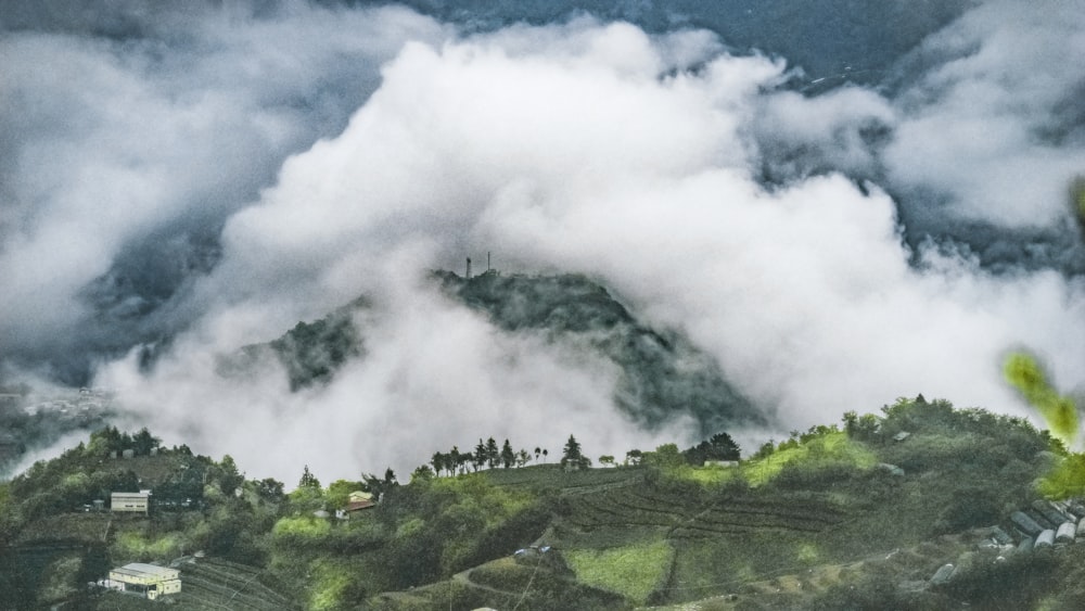 a landscape with clouds and trees